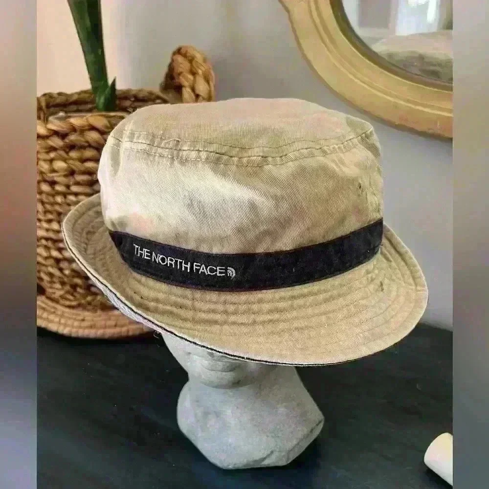 THE NORTH FACE Khaki Bucket Hat with Blue Trim band. Size M .